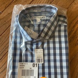 Baby blue and navy blue checked shirt.